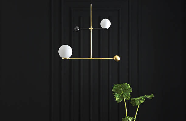 istock Modern gold floor lamp with frosted globe in dark interior 2227119317