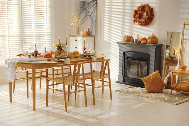 istock Stylish dining room with beautiful table setting and autumn decor 2227120721