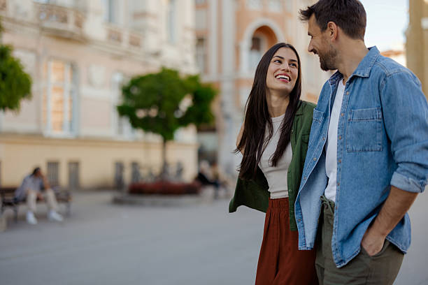 istock Young Couple Bonding During City Walk 2227120777
