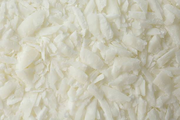 istock White soy wax flakes as background, closeup 2227121279