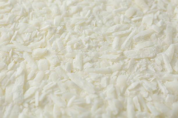istock White soy wax flakes as background, closeup 2227121293