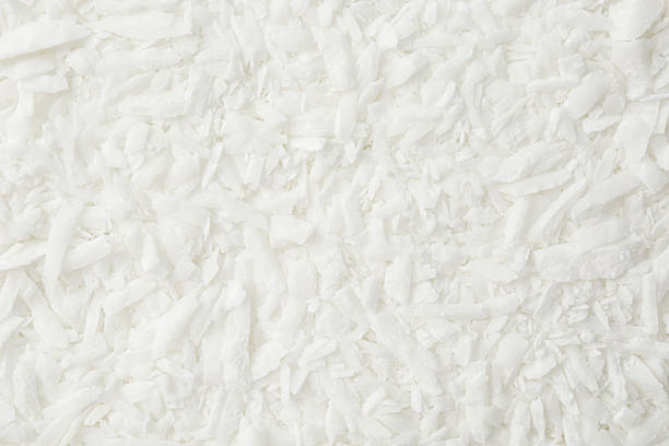 istock White soy wax flakes as background, closeup 2227121299