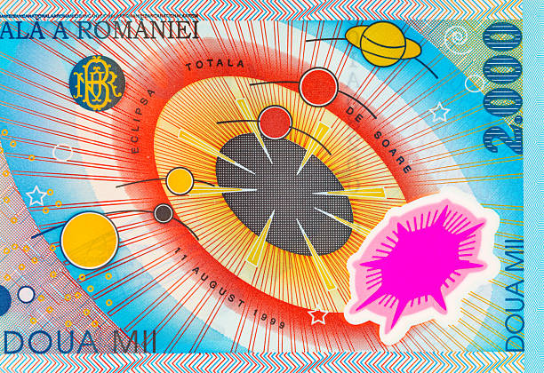 istock 2000 Lei Romania, 1999 with a simplified Solar System and a solar eclipse. Polymer money of Romania and Europe. 2227126970