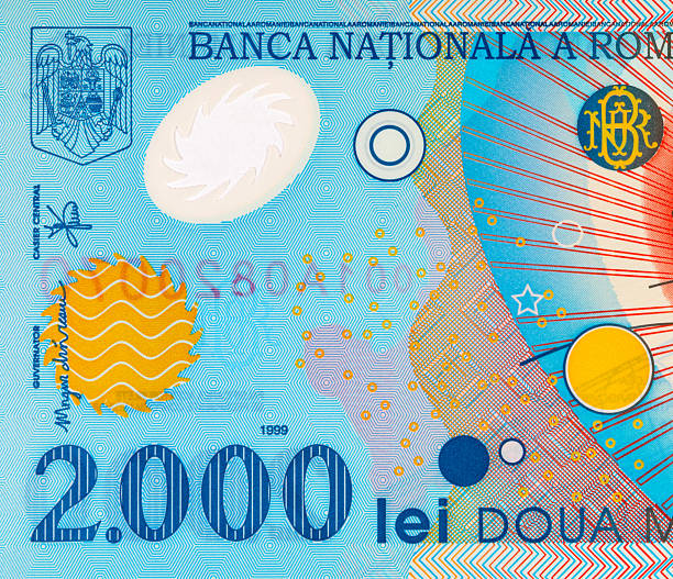 istock 2000 Lei Romania, 1999 with a simplified Solar System and a solar eclipse. Polymer money of Romania and Europe. 2227126986