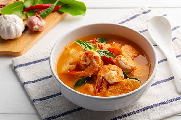 istock Red curry Pineapple and shrimp in white bowl. 2227127414