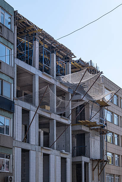 istock Safety precautions taken with netting in building construction. work safety. 2227131945