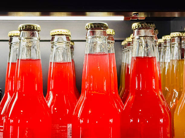 istock Red Soda Bottles on Shelf Mockup 2227134386