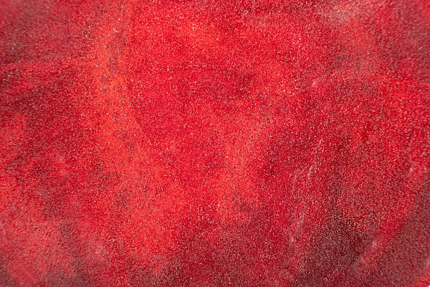 istock Macro texture of raw red beetroot top view, abstract vegetable cooking background. 2227136647