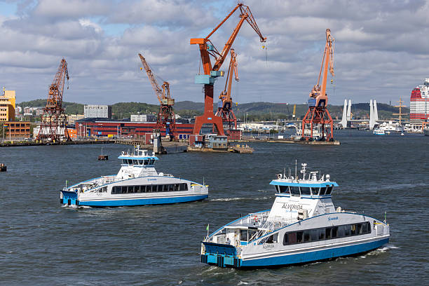 Gothenburg, Sweden May 30, 2025 Passenger ferry boats on the Gota Alv in downtown.