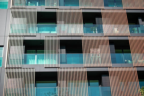 istock Modern Building Facade with Vertical Wooden Screens 2227143107