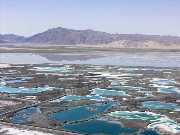 istock Salt Pans and Reflective Waters 2227151063