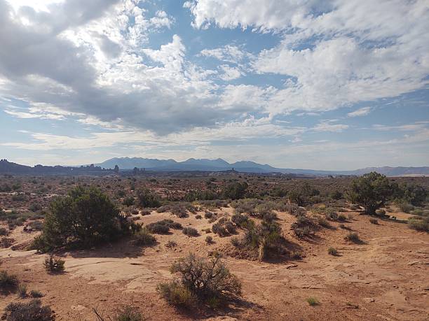 Photo of desert landscape and dramatic sky Moab Utah