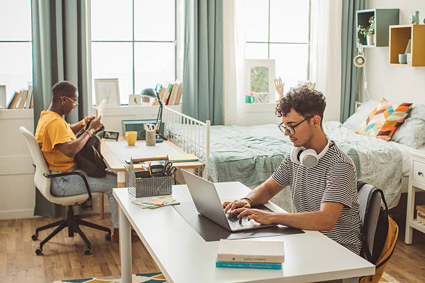 istock Friends at college dorm room 2227157082