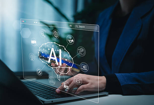 istock Artificial Intelligence Technology in Business Environment. Person using laptop with AI icons, automation, data analysis, AI Agent, chatbot, AI assistant, big data, and digital tech for innovation. 2227157833