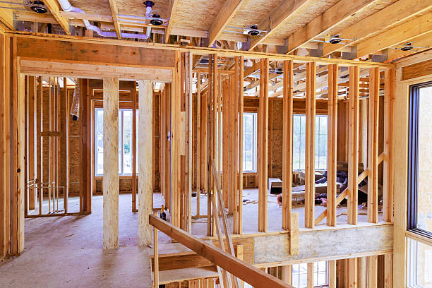 istock Construction of modern house interior wooden framing large windows under natural light 2227164793