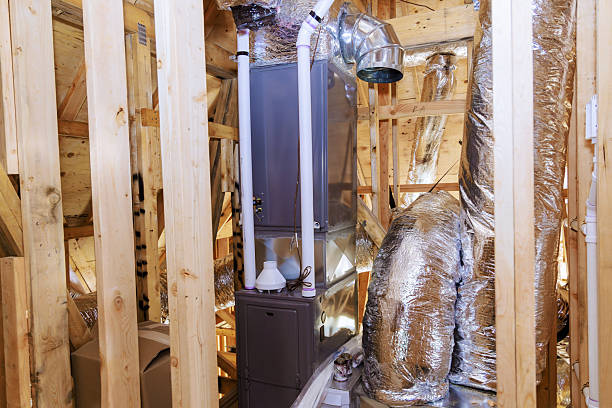 istock Heating system installation in residential attic with exposed wooden beams insulation 2227164820