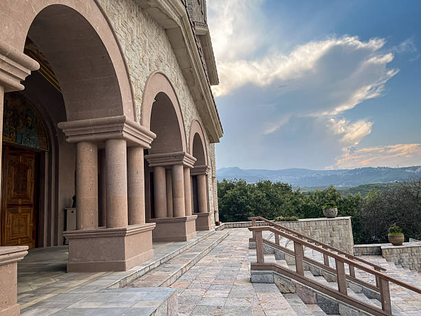 istock Stone Church Facade with Scenic Mountain View at Sunset 2227169239