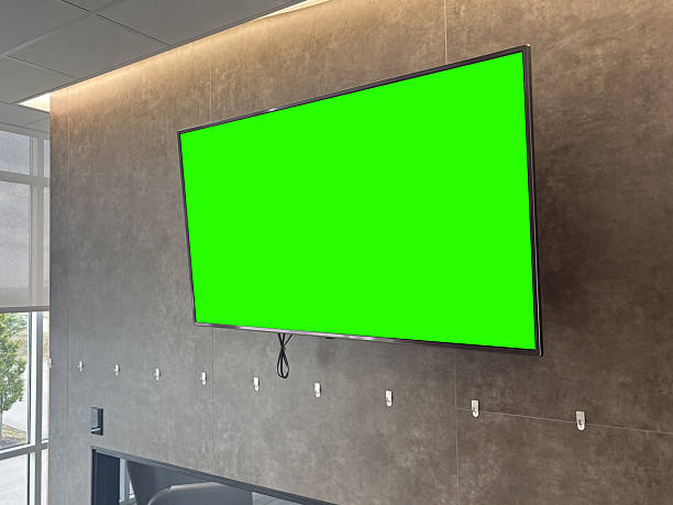 istock Wall Mounted Green Screen TV in Corporate Lobby 2227170224