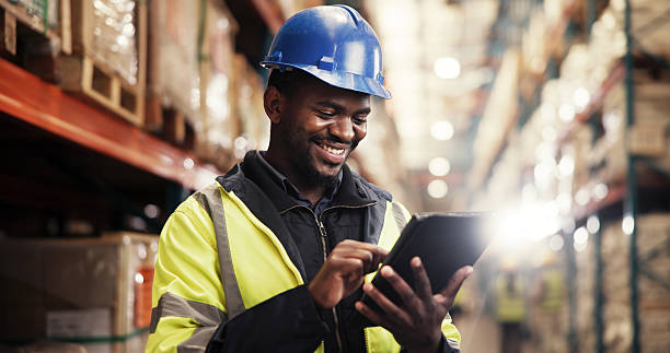 istock Distribution, shipping and black man in warehouse, tablet and logistics with quality control. African person, employee and inspector with inventory, supply chain or check stock with manufacturing 2227171382