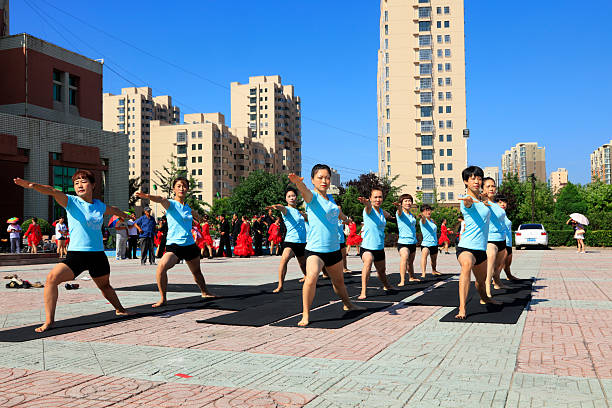 Tangshan - August 8: yoga performance show in the park, on August 8, 2016, tangshan city, hebei province, China