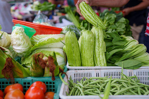 Fresh Vegetables on Display at a Market Stall