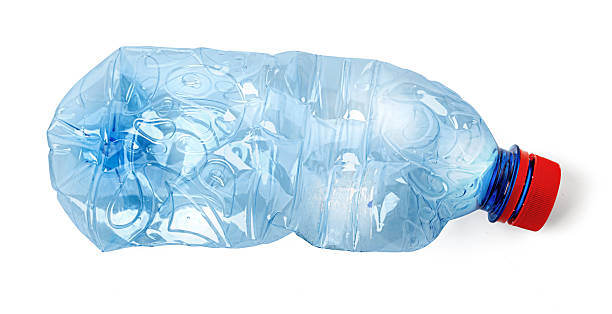 Crushed plastic bottle symbolizing recycling and environmental conservation