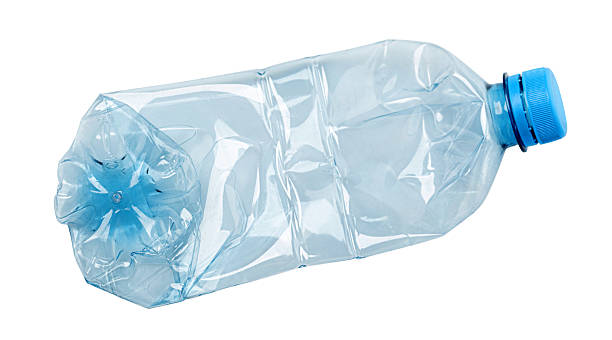 istock Crushed plastic bottle symbolizing recycling and environmental conservation 2227182865