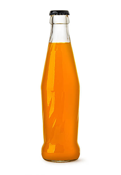 istock Glass bottle containing refreshing orange juice on white background 2227182904