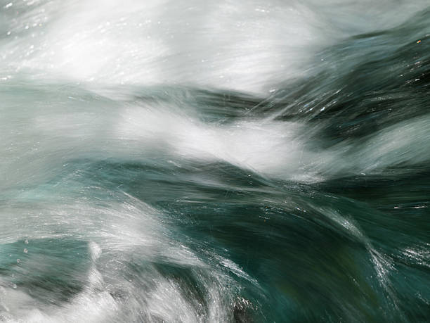 istock Long exposure photograph of a forest river 2227183518