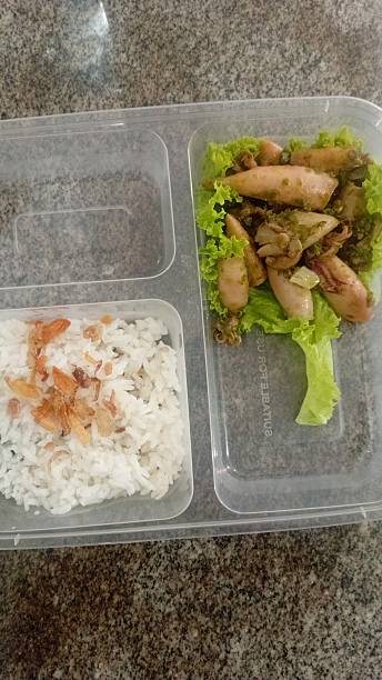 istock rice and  Fry Squid with Green Pepper on the plastic cointainer 2227186283