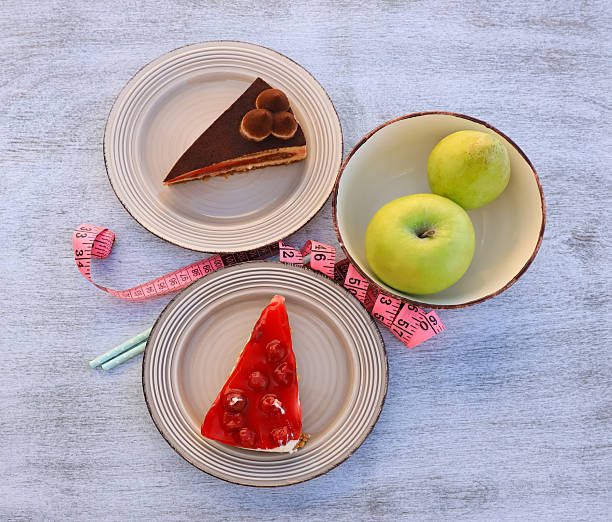 selection with  green apple  while Healthy lifestyle concept, Diet plan
