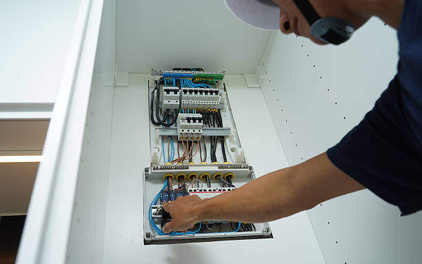 istock Electrician working checking a switchboard with fuses 2227194496