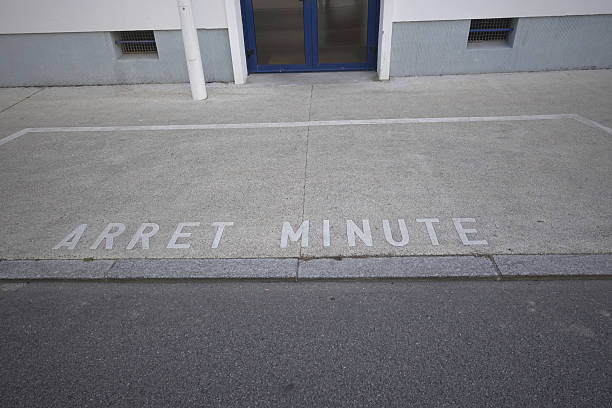 istock Short-term parking  Authorized short-term parking marked out in front of an administrative building 2227201617