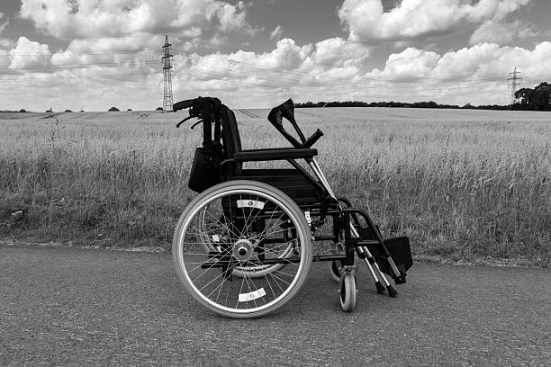 This striking photograph, “Loneliness in the Crowd,” masterfully captures the feeling of isolation amid the rush of urban life. The black and white tones enhance the melancholic atmosphere, focusing the viewer’s attention on emotions and movement rather than distractions of color.\n\nThe central figure—an elderly person moving with the aid of a walker—stands out as the only sharply defined presence in a blurred, chaotic reality. The surrounding figures, dissolved into motion, create a sense of detachment, anonymity, and the indifference of a fast-paced city.\n\nThrough the use of long exposure and motion blur, the image takes on a painterly quality. Despite being surrounded by people, the subject appears physically and emotionally disconnected from them.\n\nThis is more than just a technically brilliant photograph—it is a thought-provoking reflection on human existence, the passage of time, and the solitude that can persist even in the heart of a crowd. It lingers in the viewer’s mind, evoking both unease and contemplation about the fate of the individual in an indifferent world.