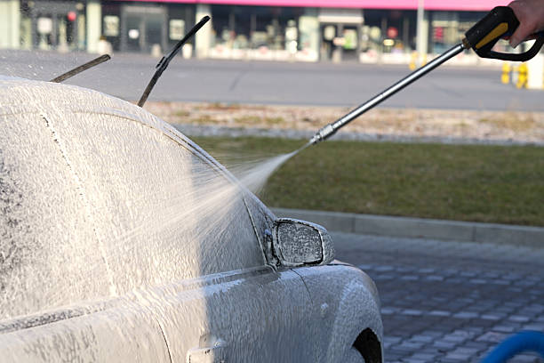 istock Car white active foam coating at car wash. 2227206151