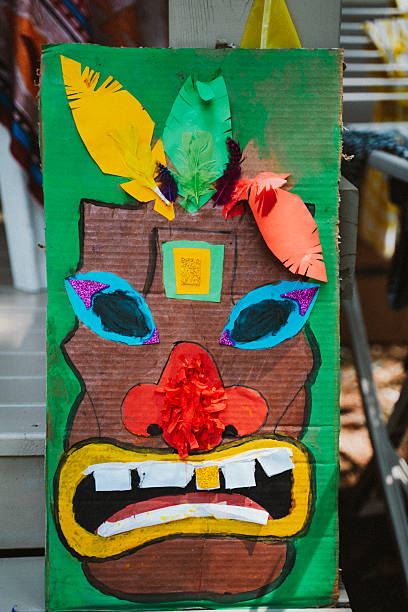 istock Colorful Cardboard Mask with Feathers and Decorations 2227207595