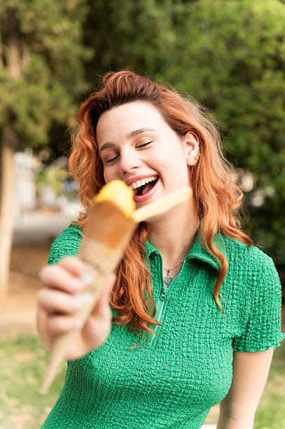 Tourist holding ice cream