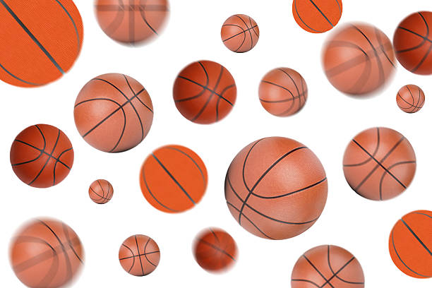 istock Multiple Floating Basketballs on White Background Creating Sports Concept 2227212776