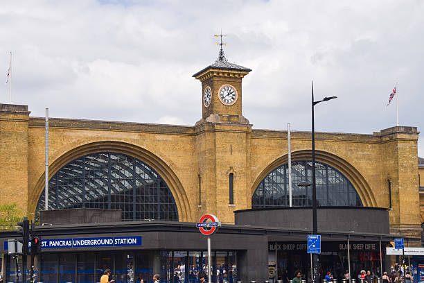 London, UK - July 13 2025: exterior daytime view of King's Cross station and King's Cross St Pancras Underground Station with people walking outside