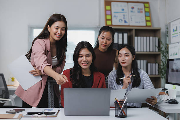 istock Young businesswomen collaborating on a project using laptop in office 2227213058