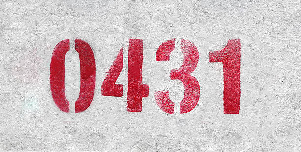istock red spray-painted number 0431 sprayed onto a white wall. 2227213359