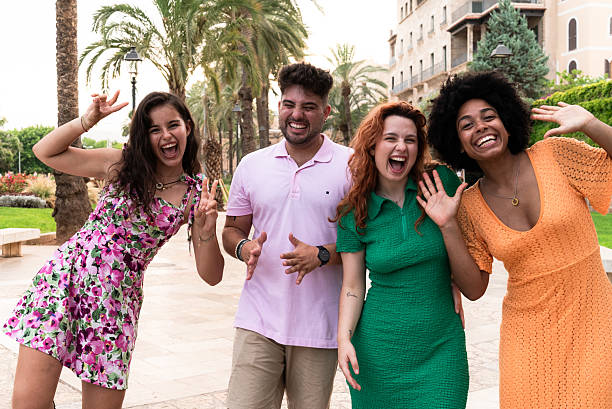 istock Four happy friends smiling and having fun on vacation 2227215134