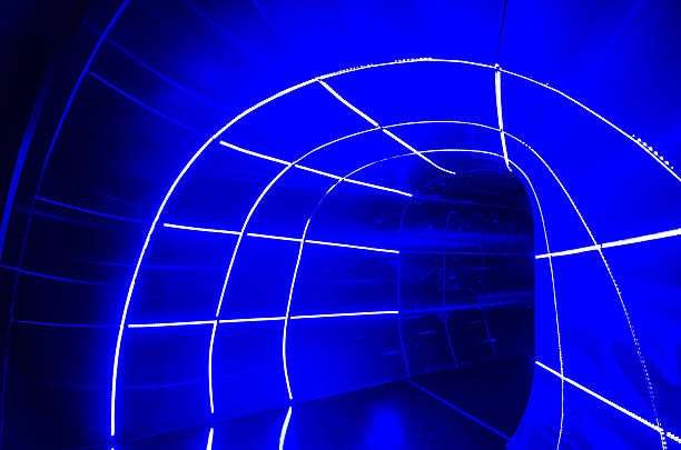 Blue illuminated light hole funnel concept of time traveling, brighten with light, luminous and shining