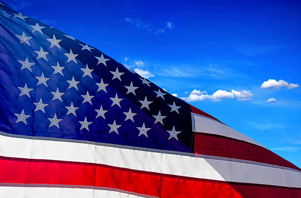 istock Close Up American Flag at flagpole 2227219757