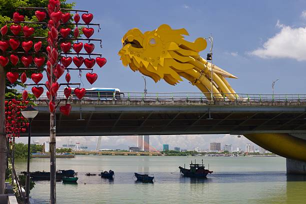 istock Dragon Bridge in Da Nang, Vietnam with Love Lock Sculptures 2227220139