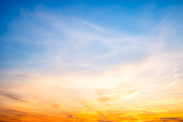 istock Beautiful , luxury soft gradient orange gold clouds and sunlight on the blue sky perfect for the background, take in evening,Twilight, Large size, high definition landscape photo 2227222410