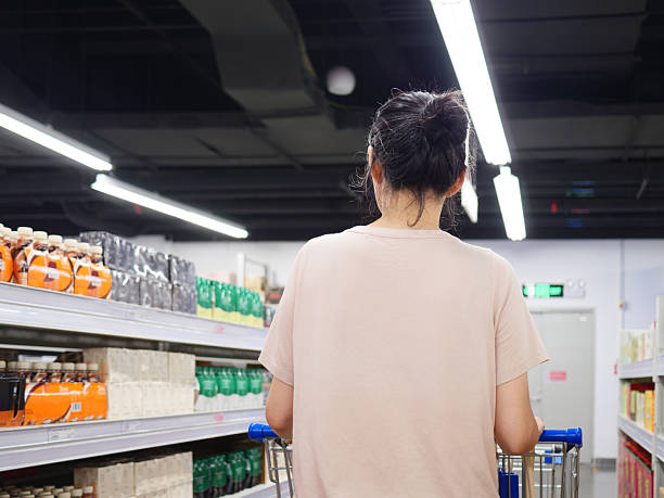 istock Female customer in supermarket 2227222451