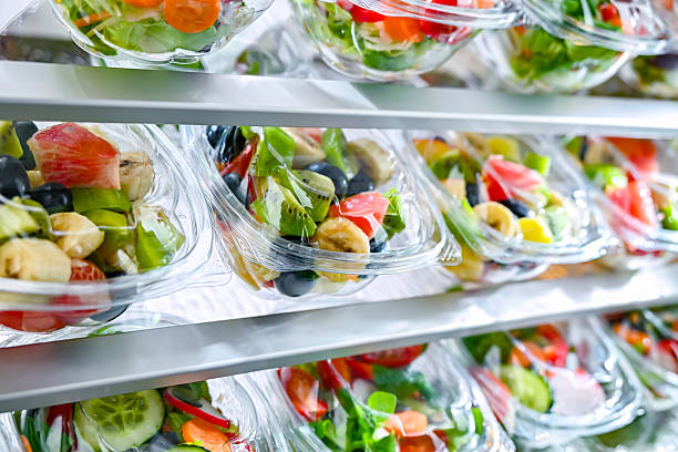 istock Boxes with fruit and vegetable salads in a commercial fridge 2227225402