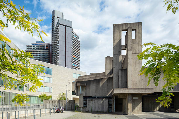 Church of the KHG (Catholic University Community) in Cologne. Built around 1969 in the Brutalist architectural style. Similar to the Unicenter in the background, which was built in the early 1970s.