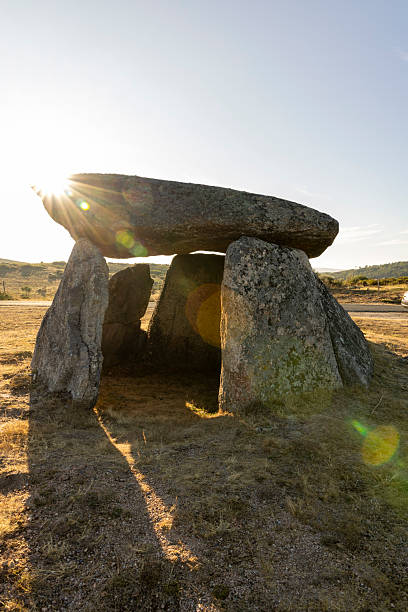 istock A large rock structure with a small opening in the middle 2227227764